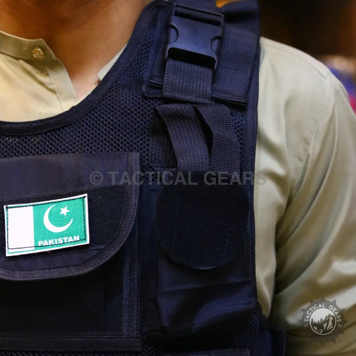 Black tactical vest with Pakistan flag patch and armor plate for military protection