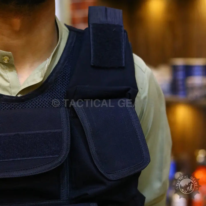 Dark blue tactical military vest with mesh and hook-and-loop fasteners for tactical military use