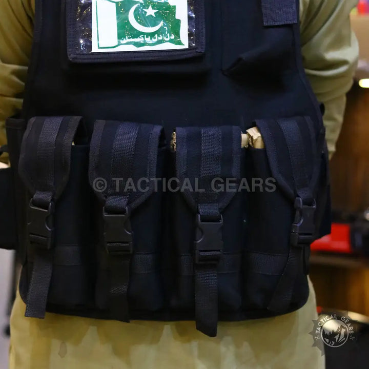 Black tactical military vest with 8 pockets, armor plate fabric, and multiple pouches