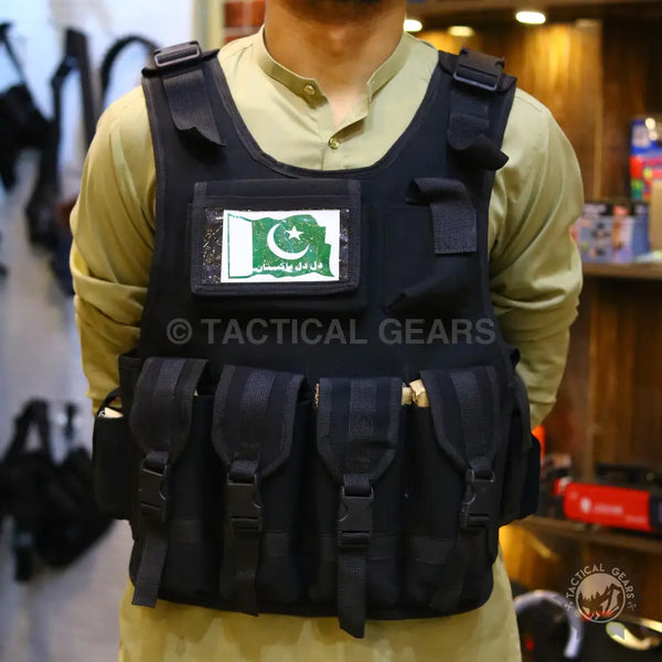 Black tactical vest with multiple pouches and armor plate fabric for military use