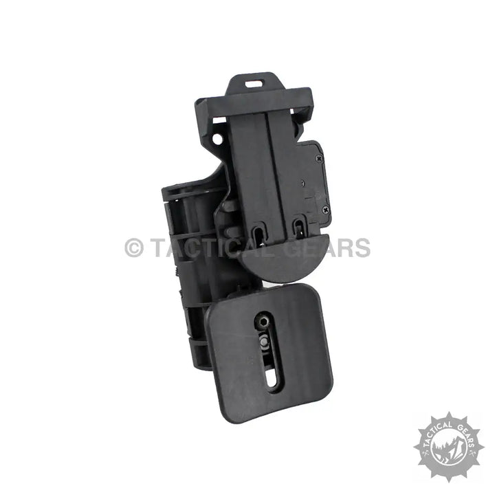 Black polymer tactical belt attachment with spring loaded design for quick cocking holster