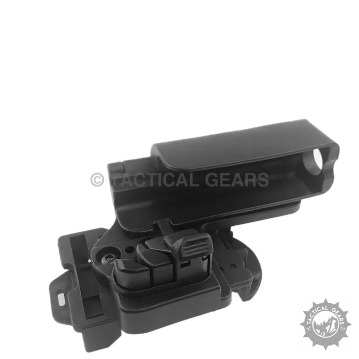 Black polymer tactical magazine pouch with spring loaded design for quick cocking holster
