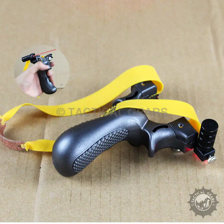 Black and yellow tactical resin slingshot with laser sight for precision shooting