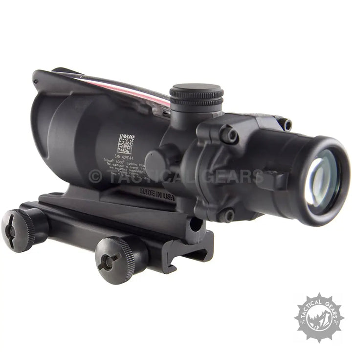 Black optical dot sight for firearms with mounting base, ideal as a Trijicon red dot sight