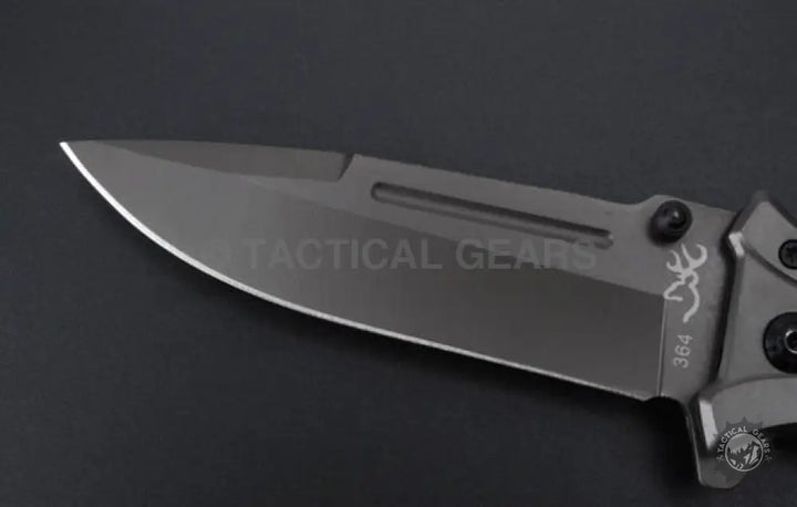 Browning 364 folding knife with rosewood handle and silver blade