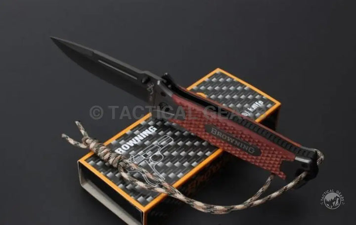 Browning 364 folding knife with rosewood handle and black blade