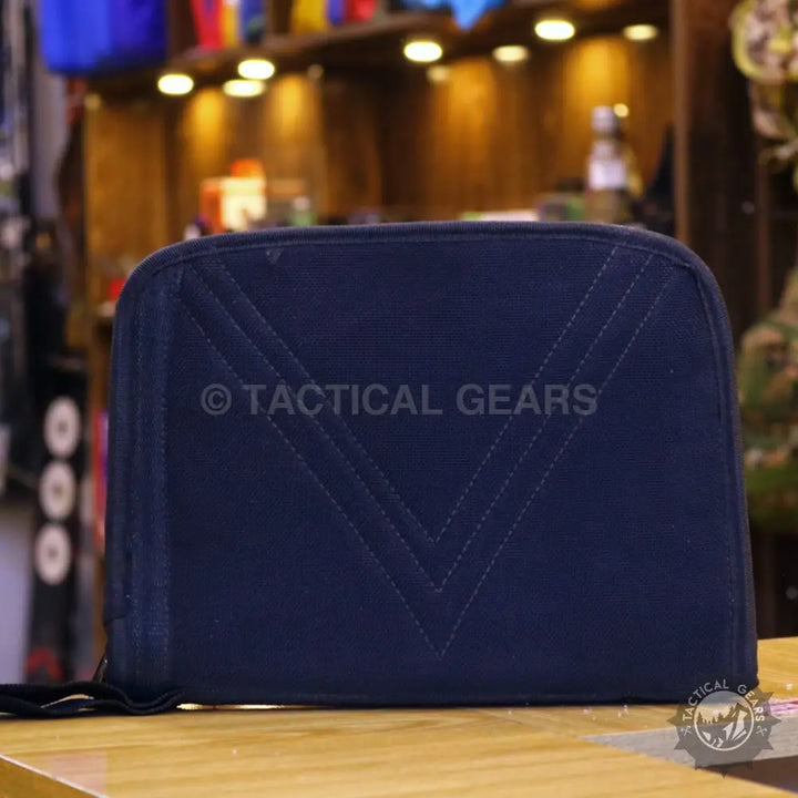Dark blue tactical safety case with zippered closure and decorative stitching