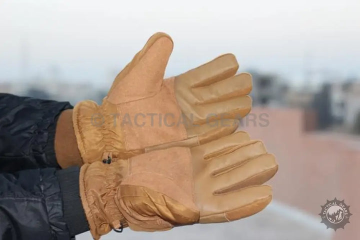 Light brown leather work gloves made from durable material for tactical and thermal use