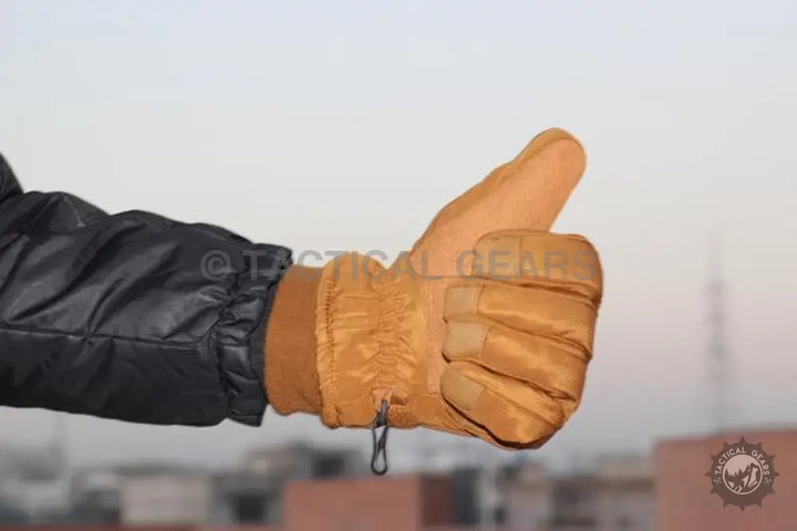 Tactical Thermal Layered Gloves in tan with thumb up gesture, made from durable material