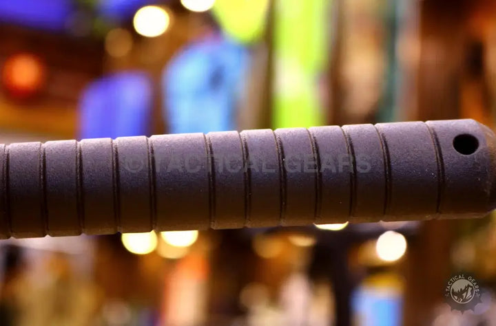 Brown leather grip on Tactical Tomahawk M-48 Axe with textured pattern