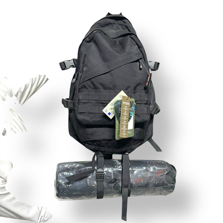 Black tactical backpack with rolled sleeping bag, part of American Lot imported tactical gear