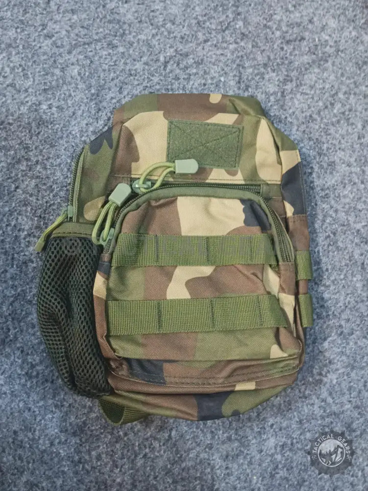 Camouflage tactical sling bag made of 600d Oxford fabric with MOLLE webbing and mesh pocket