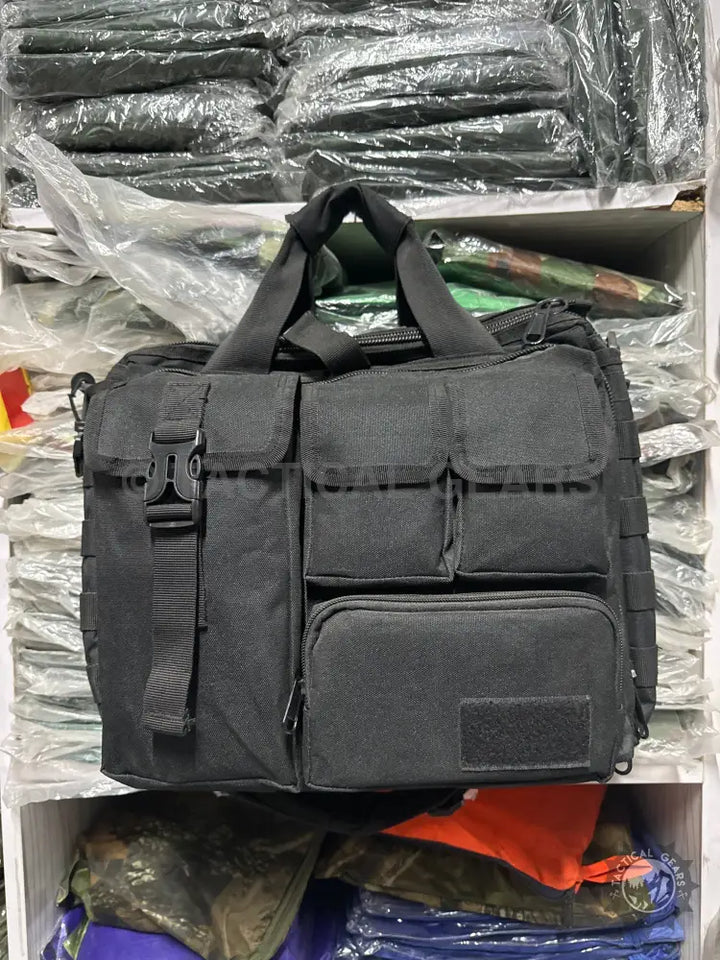 Black tactical messenger bag with multiple pockets and shoulder strap for laptop storage