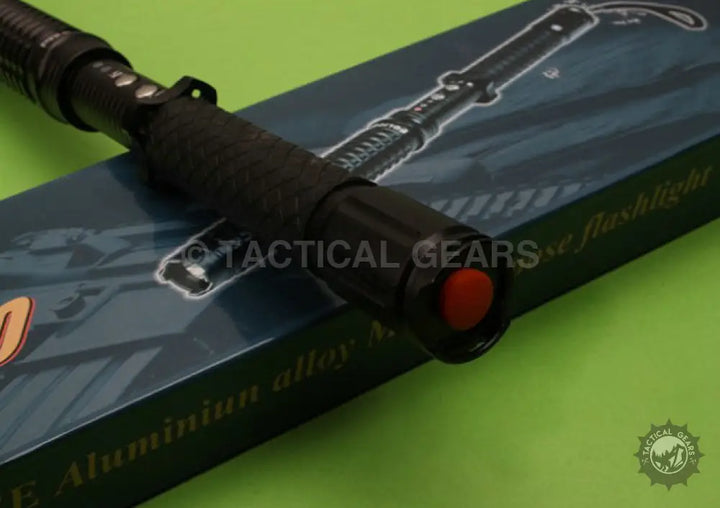 Black telescopic stun baton with red activation button from X10 Stun-Gun & Baton & Torch