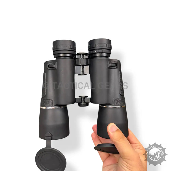 Black Textured Grip Optical 10x50 Binoculars with attached lens caps for enhanced viewing