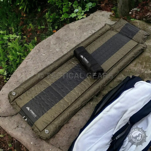 Olive green and black IFORREST camping sleeping pad with rolled-up black bag