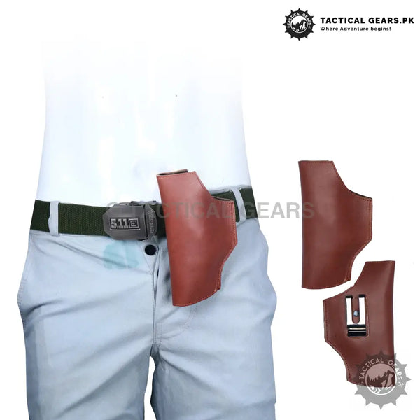 Brown leather universal belt holster worn on a green tactical belt for secure carry