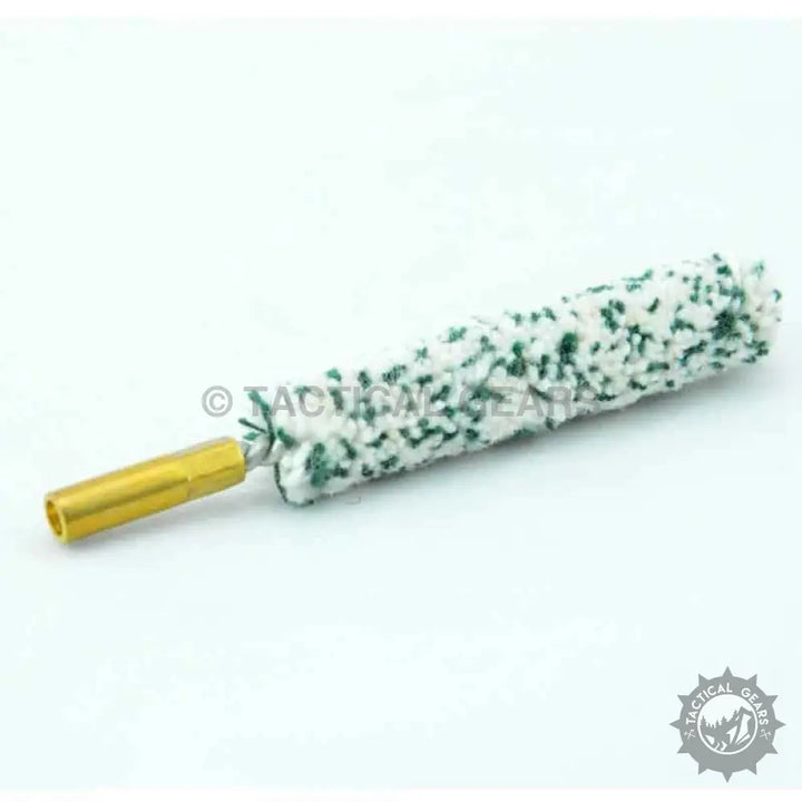 Green and white speckled nylon bristle brush with gold ferrule in cleaning tool kit