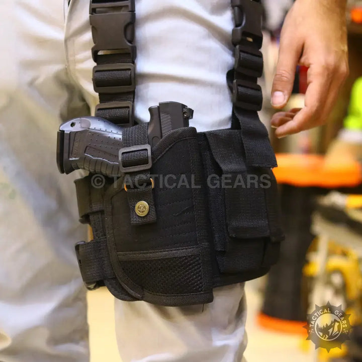 Black tactical leg holster with pistol and multiple pouches for versatile carry