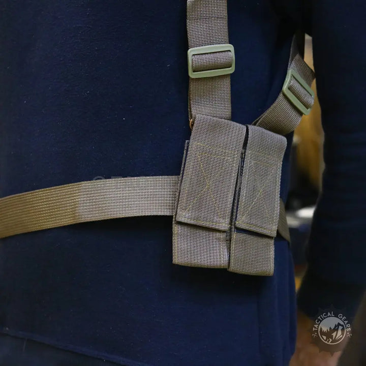 Tactical chest rig with magazine pouches for versatile firearm carrying