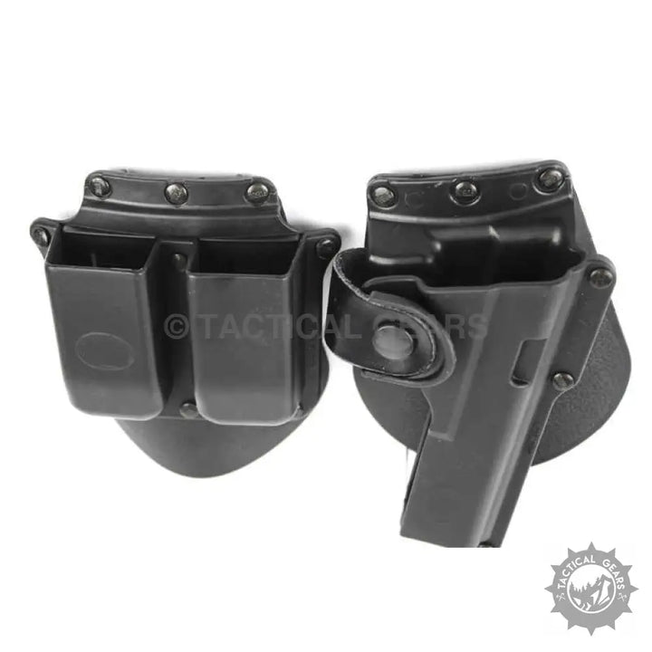 Black plastic tactical polymer holster with internal rubber insert and double magazine pouch