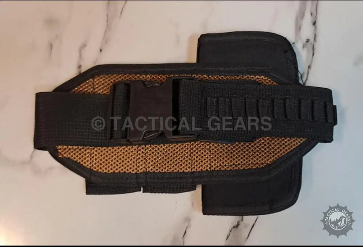 Black tactical fabric belt with quick-release buckle and shell loops for holster use