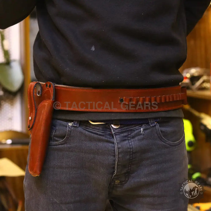Brown leather belt with holster and cartridge loops for universal waist holster use
