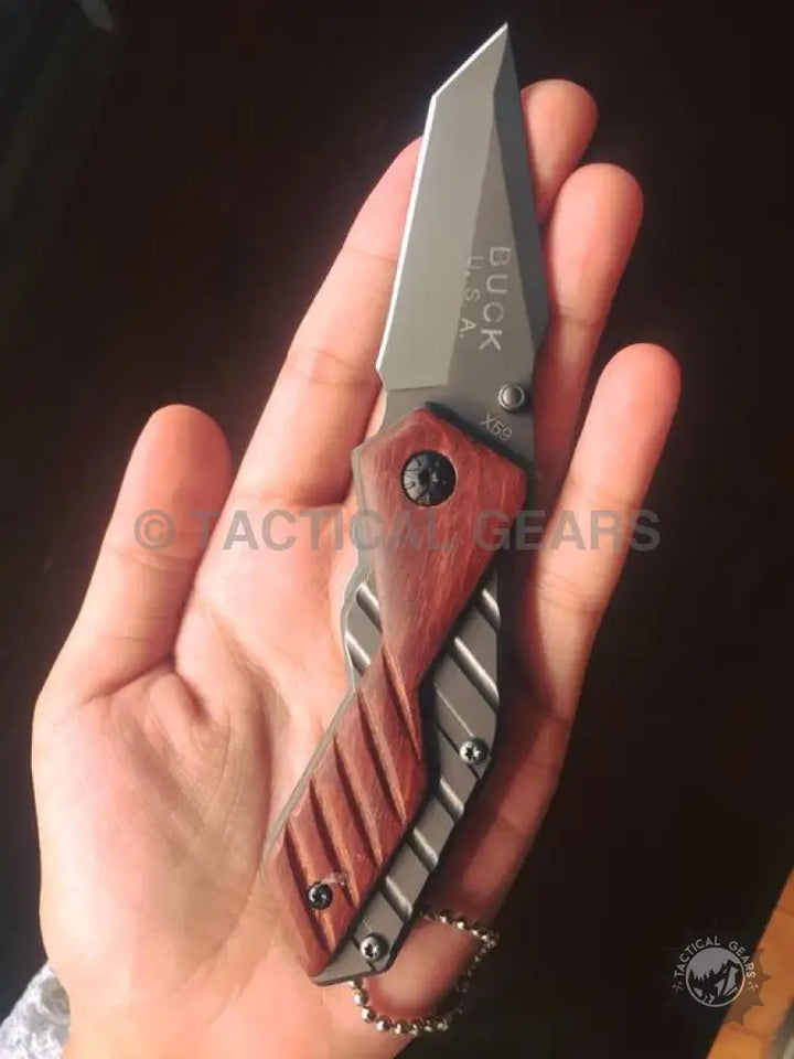 Buck USA X59 Tactical Mini Folding Knife with dark gray tanto blade and wood handle
