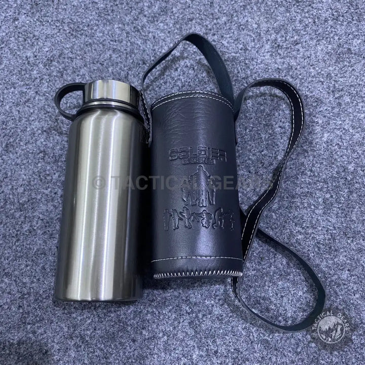 Stainless steel vacuum bottle with a black leather cover for stylish hydration