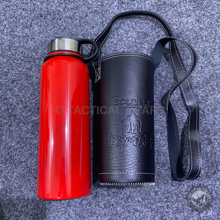 Red insulated vacuum bottle with black leather cover for stylish hydration