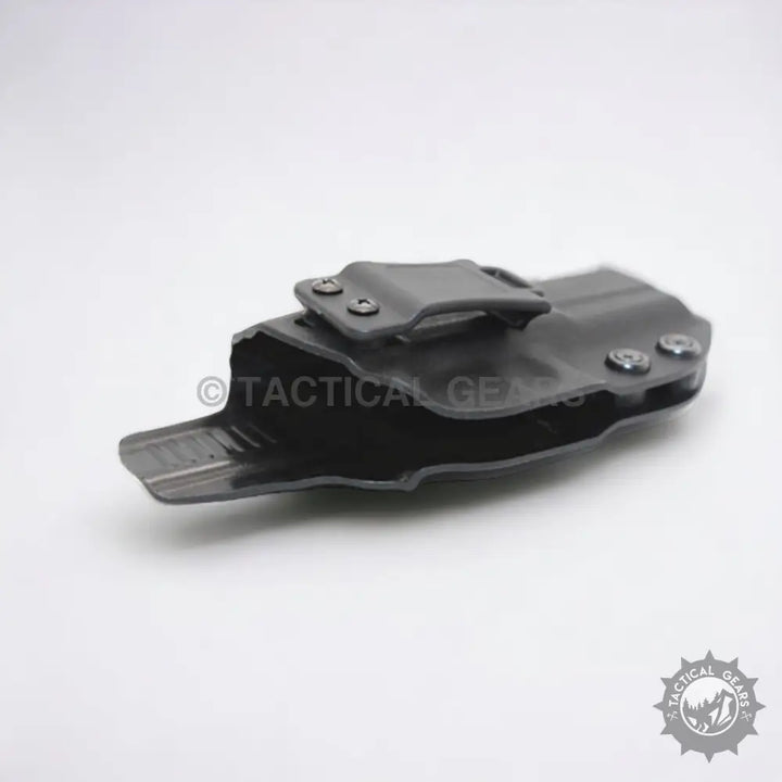 Black Kydex waistband pistol case holster with adjustable belt clip for secure carry