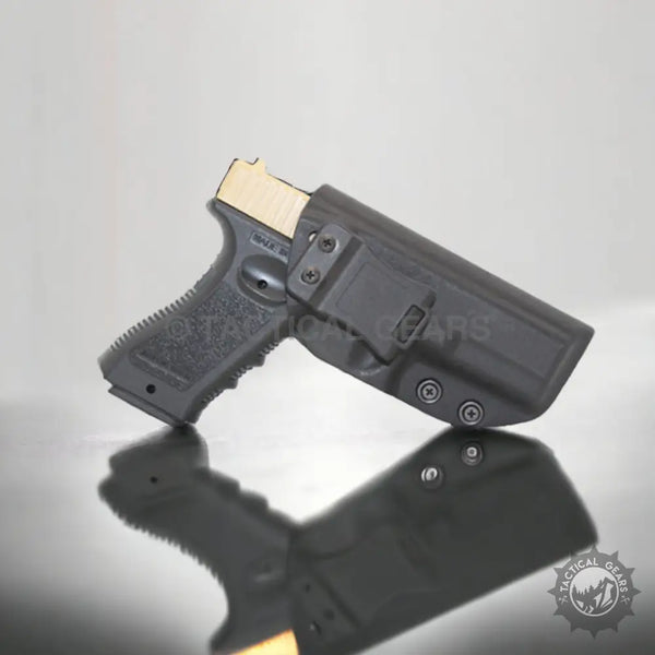 Black pistol with tan slide in waistband pistol case holster for secure concealment