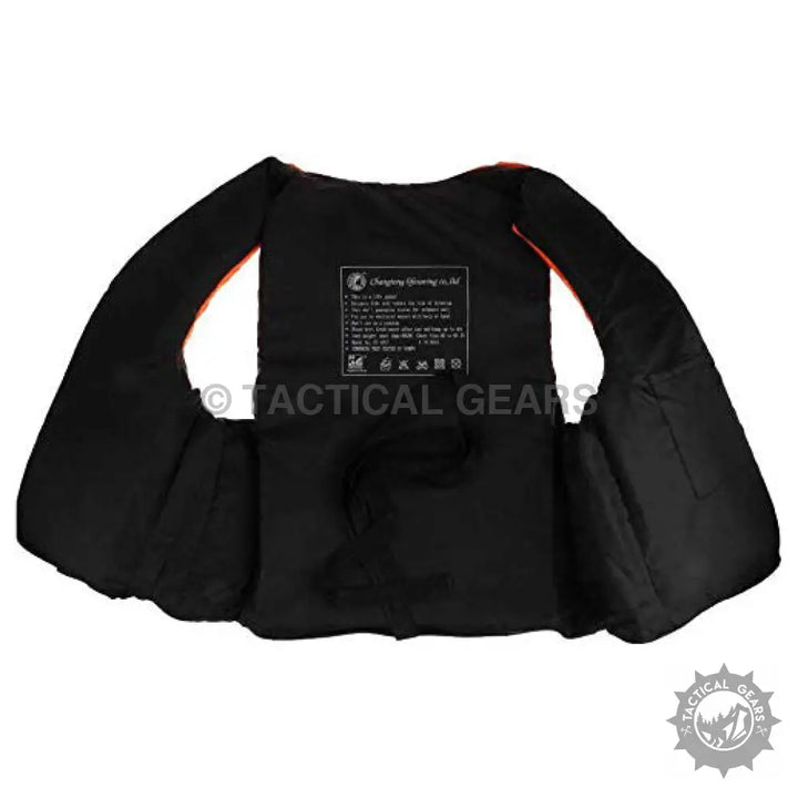 Black life vest with orange trim for water skiing featuring quick release buckles and polyester outer shell