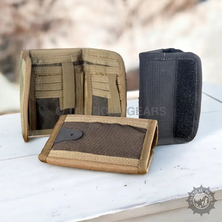Three tactical wallets in various colors and designs made from waterproof nylon canvas