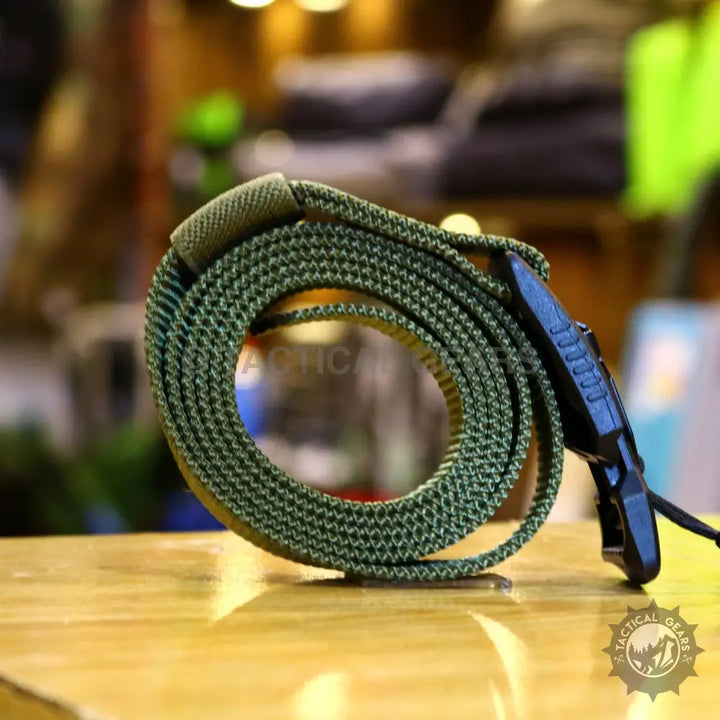Dark green tactical web belt with black plastic buckle and adjustable strap