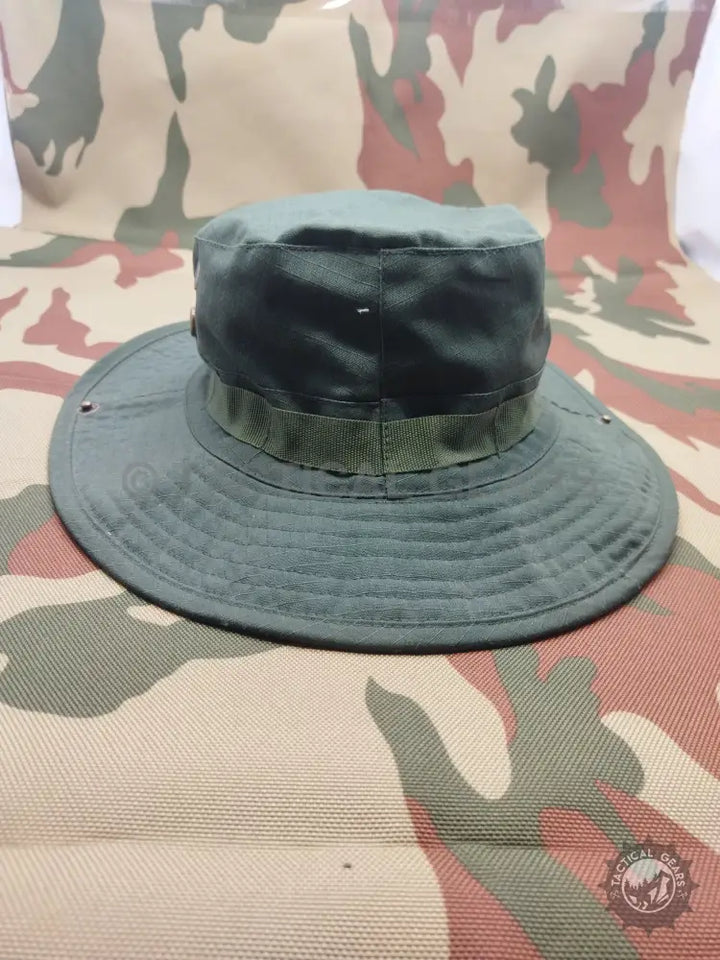 Dark green boonie hat with wide brim and ventilation eyelets for summer outdoor wear