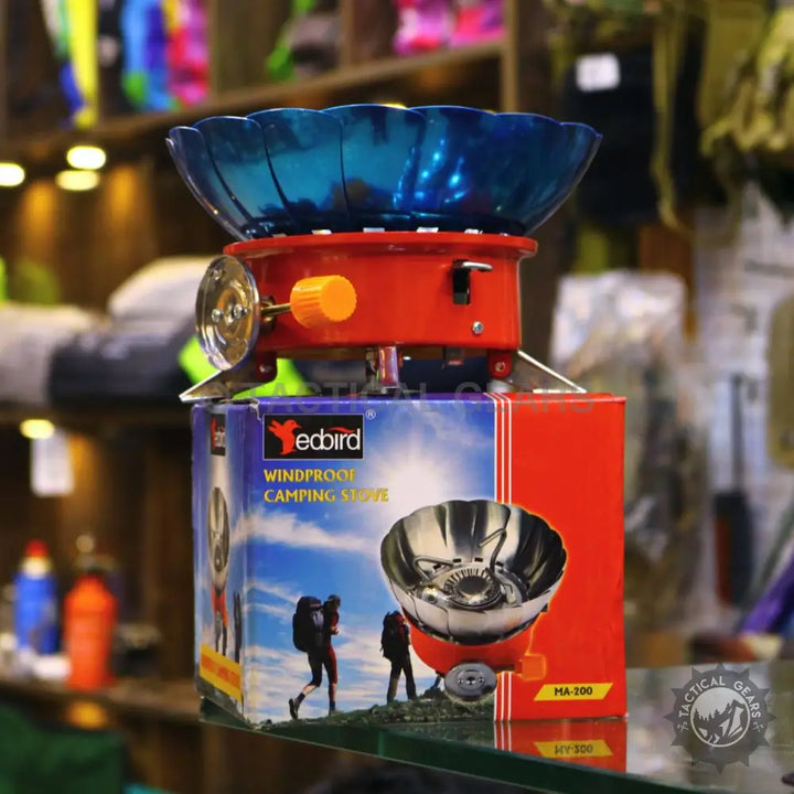 Red and blue Windshield Lotus Camping Stove with windproof design for outdoor cooking