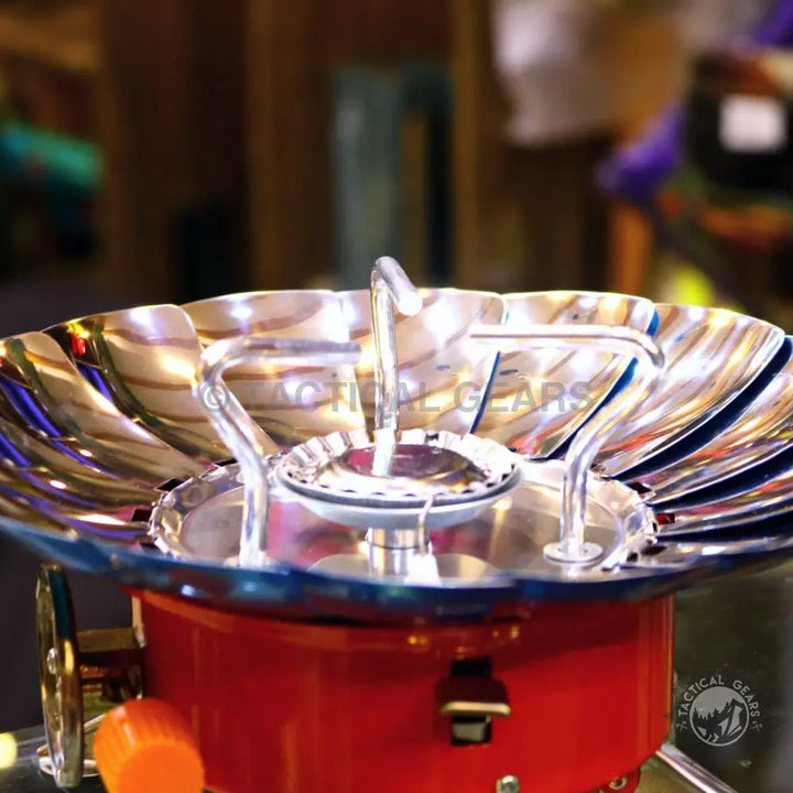 Red Camping Stove with Silver Windshield and Pot Supports for Lotus Camping Stove