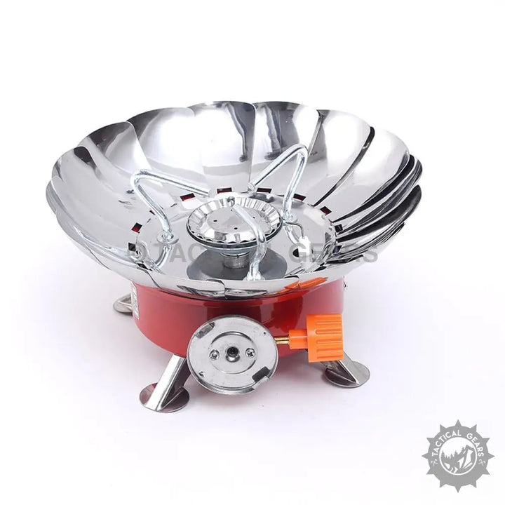 Red and silver Windshield Lotus Camping Stove with wind guard for outdoor cooking