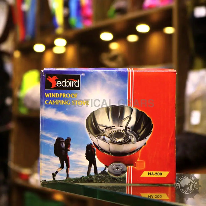 Packaged Windshield Lotus Camping Stove with red and blue windproof design and chrome burner