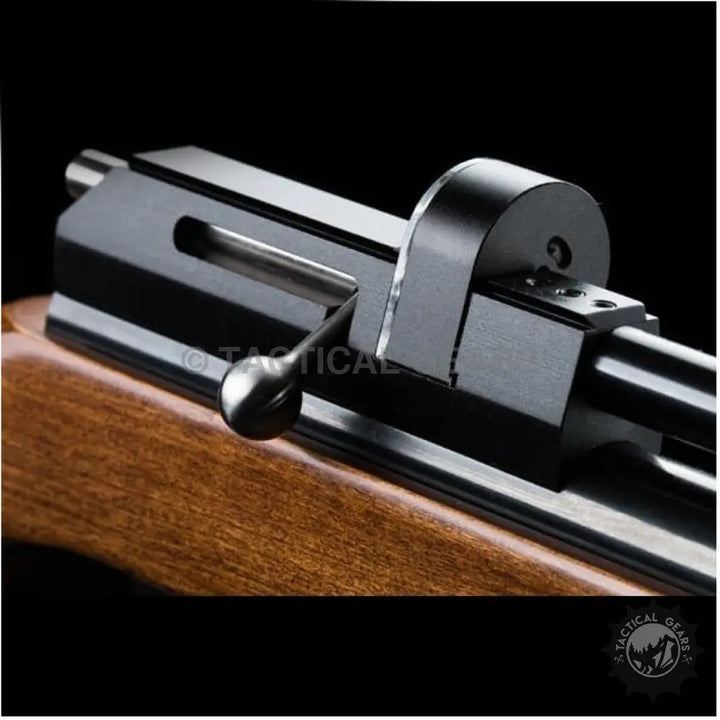 Close-up of ARTEMIS PCP PR 900 air rifle receiver, bolt, and wooden stock