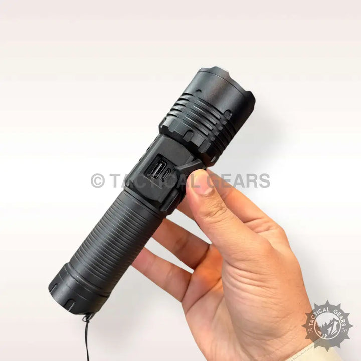 Black X-Balong PM10 USB flashlight with ridged grip and USB charging port