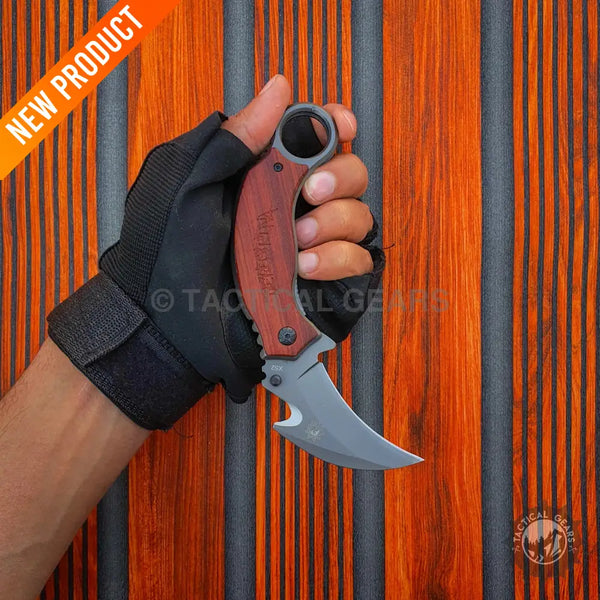 X52 Karambit Tactical Folding Knife with wooden handle and finger hole for tactical use