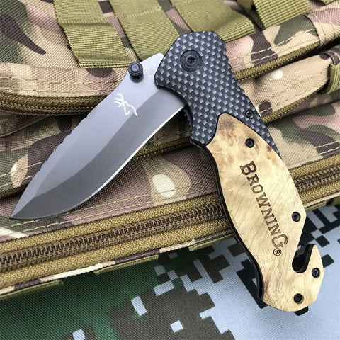 Browning X50 Tactical folding knife with dark gray blade and tan wooden grip