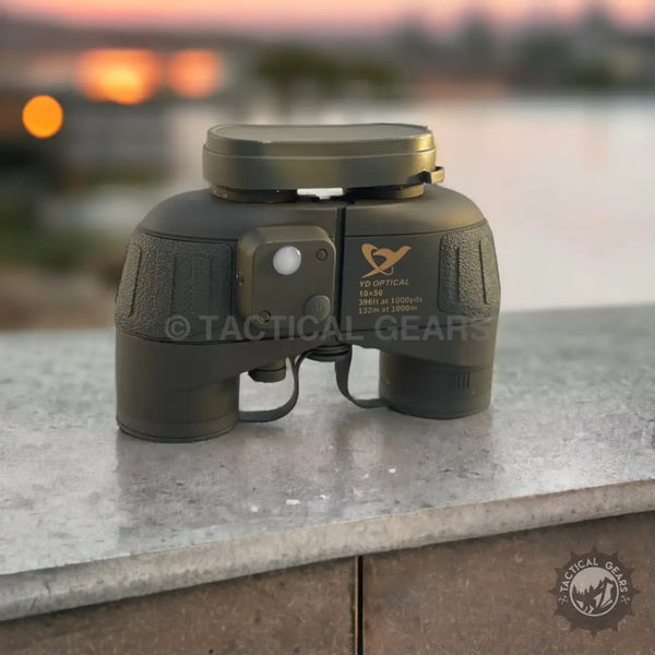 Dark green hunting binoculars with built-in light and rangefinder for outdoor adventures