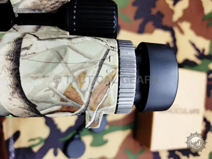 Camouflage-patterned monocular with textured silver focus ring for Yuko Binoculars 10x42